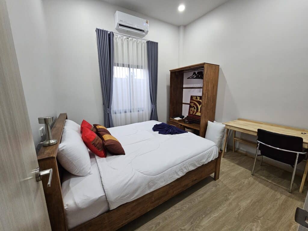 bedroom 2 with king size and working space area