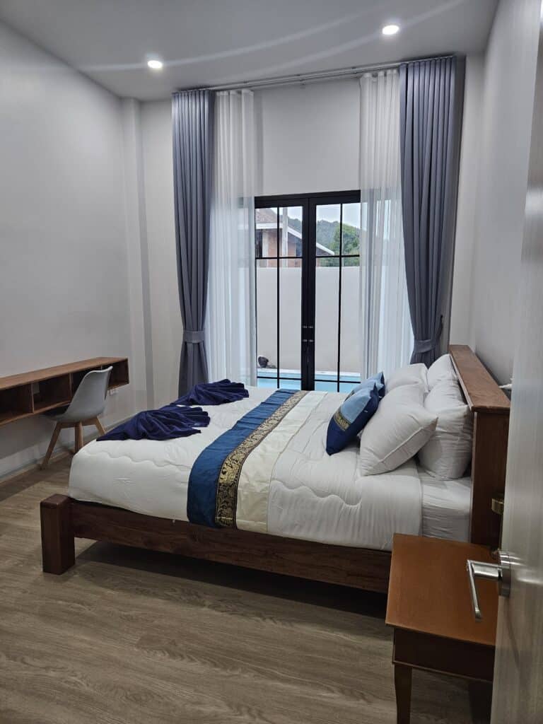 Master bedroom king-size pool view entrance